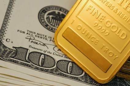 Dólar y acciones contribuyen a caída del precio del oro